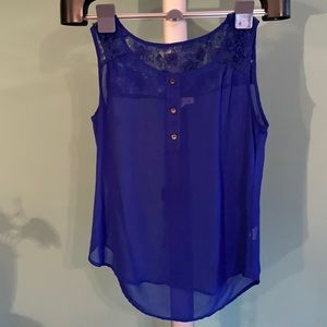 Stain on the top right but not very noticeable.